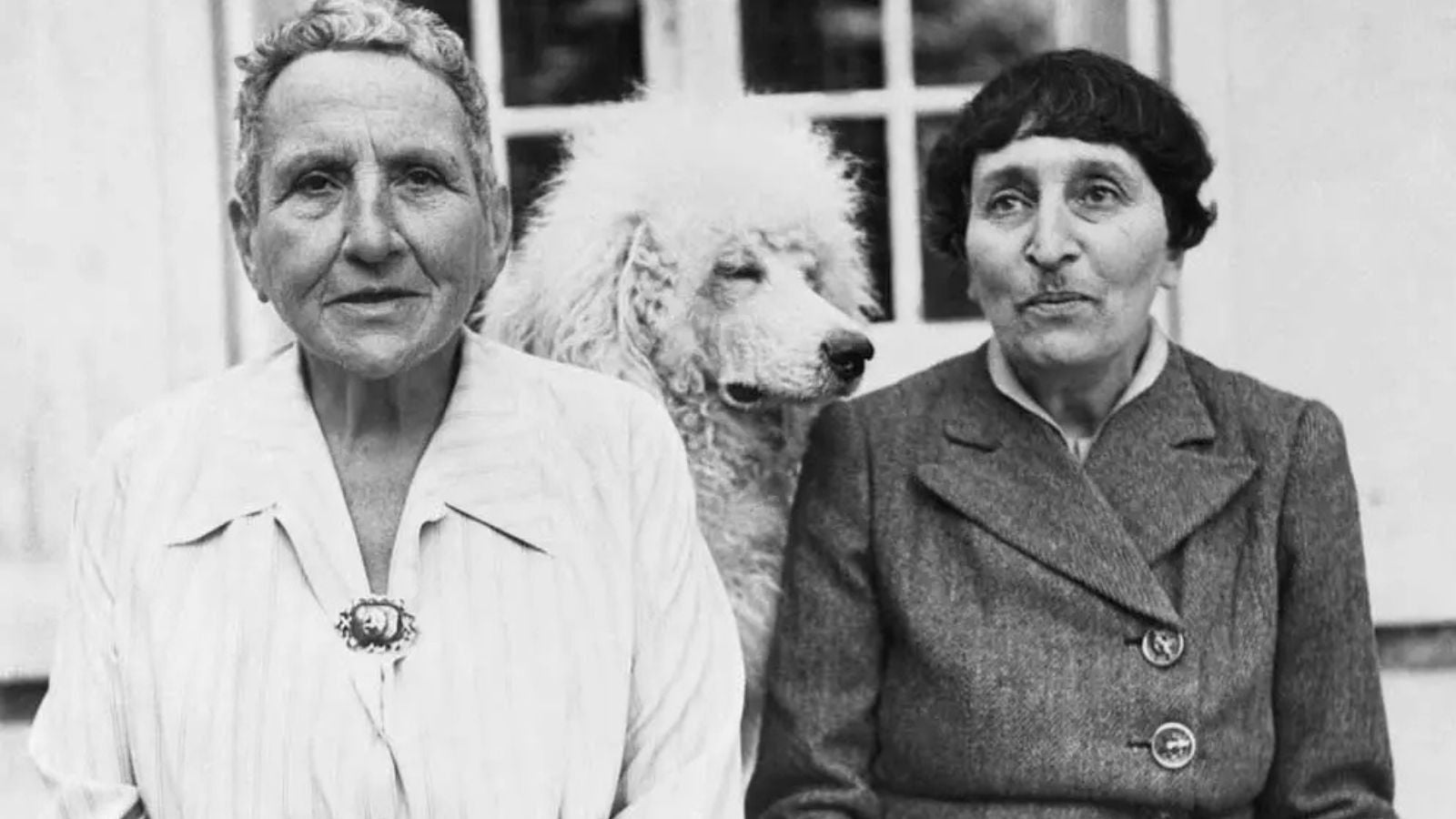 Gertrude Stein and Alice B. Toklas with their dog Basket